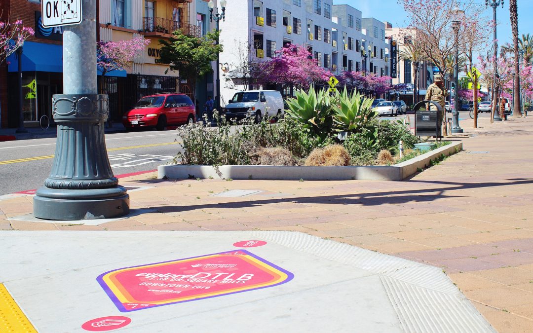 Explore DTLB! Sidewalk Decal Project Keeps Downtown Visitors on the Right Foot