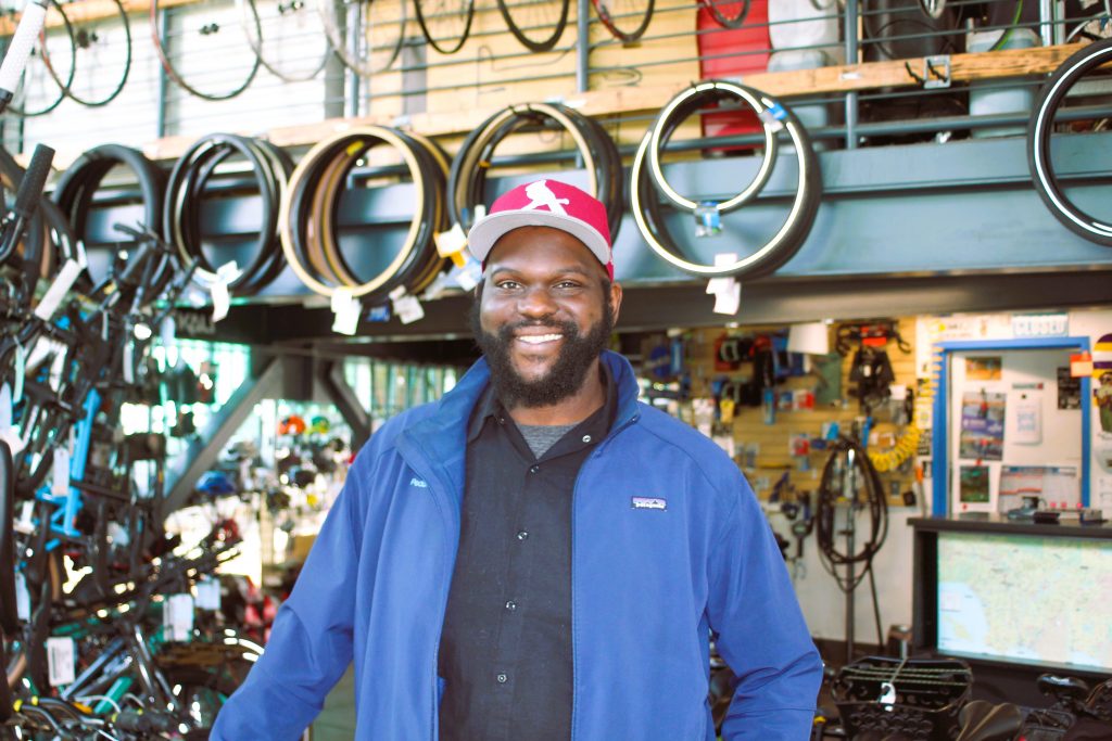 Justin Harris poses in the DTLB Pedal Movement Bike Hub