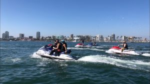 people on a sea doo just outside dtlb on the water