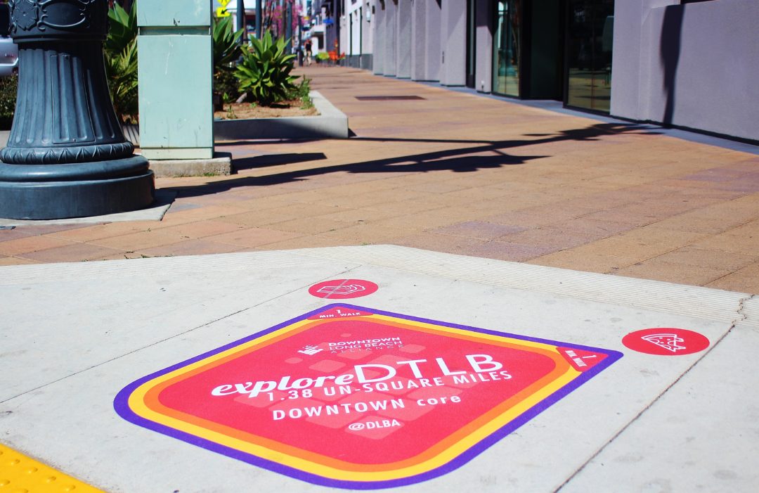 Explore DTLB! Sidewalk Decal Project Keeps Downtown Visitors on the