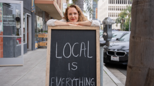 Local is Everything written on a chalk board in the east village of dtlb